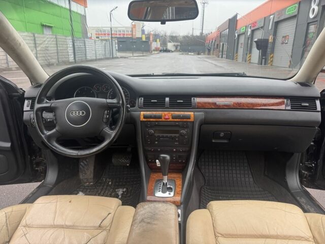 Черный Ауди А6, объемом двигателя 2.5 л и пробегом 300 тыс. км за 2350 $, фото 11 на Automoto.ua