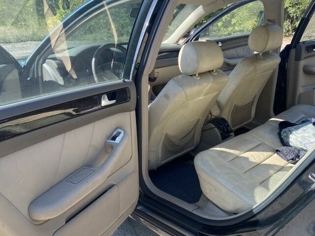 Черный Ауди А6, объемом двигателя 2.5 л и пробегом 400 тыс. км за 4000 $, фото 4 на Automoto.ua