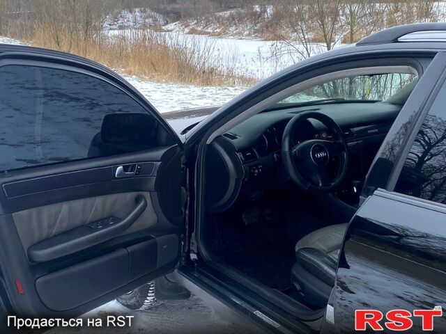 Черный Ауди А6, объемом двигателя 2.5 л и пробегом 190 тыс. км за 8700 $, фото 6 на Automoto.ua