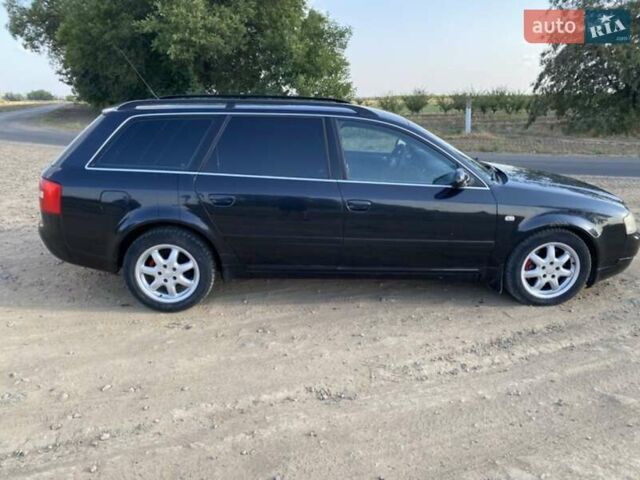 Черный Ауди А6, объемом двигателя 2.5 л и пробегом 370 тыс. км за 4500 $, фото 4 на Automoto.ua