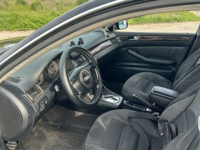 Черный Ауди А6, объемом двигателя 2.5 л и пробегом 281 тыс. км за 3000 $, фото 4 на Automoto.ua