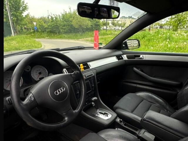 Черный Ауди А6, объемом двигателя 2.5 л и пробегом 288 тыс. км за 4900 $, фото 3 на Automoto.ua