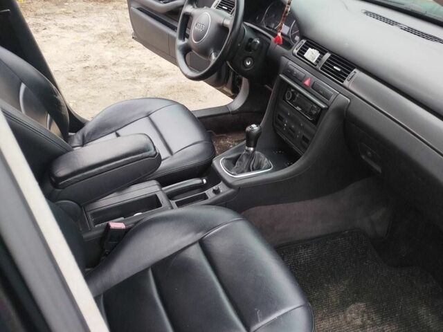 Черный Ауди А6, объемом двигателя 2.4 л и пробегом 230 тыс. км за 3300 $, фото 4 на Automoto.ua