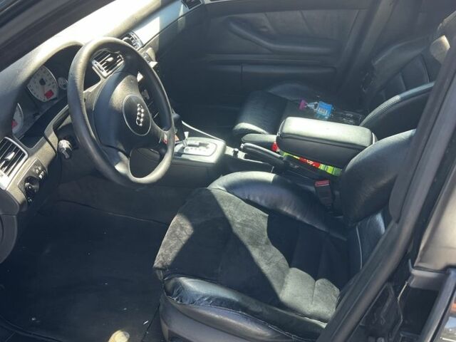 Черный Ауди А6, объемом двигателя 2.5 л и пробегом 352 тыс. км за 6000 $, фото 1 на Automoto.ua