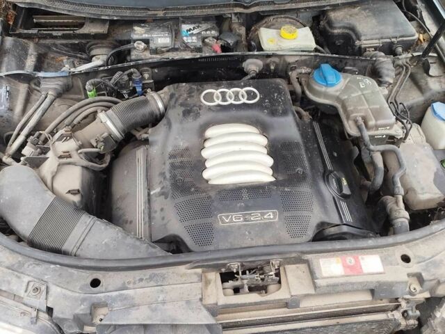 Черный Ауди А6, объемом двигателя 2.4 л и пробегом 230 тыс. км за 3300 $, фото 7 на Automoto.ua