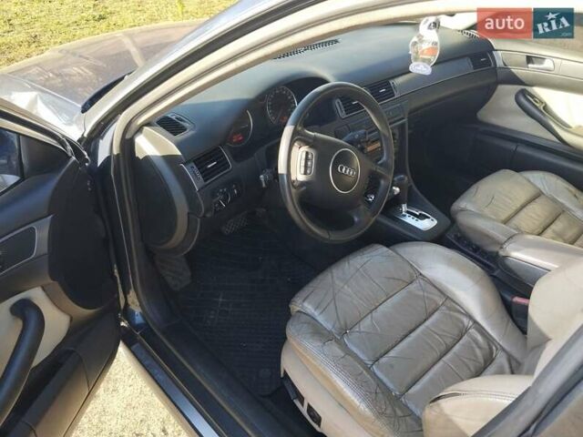 Черный Ауди А6, объемом двигателя 2.5 л и пробегом 248 тыс. км за 1750 $, фото 1 на Automoto.ua