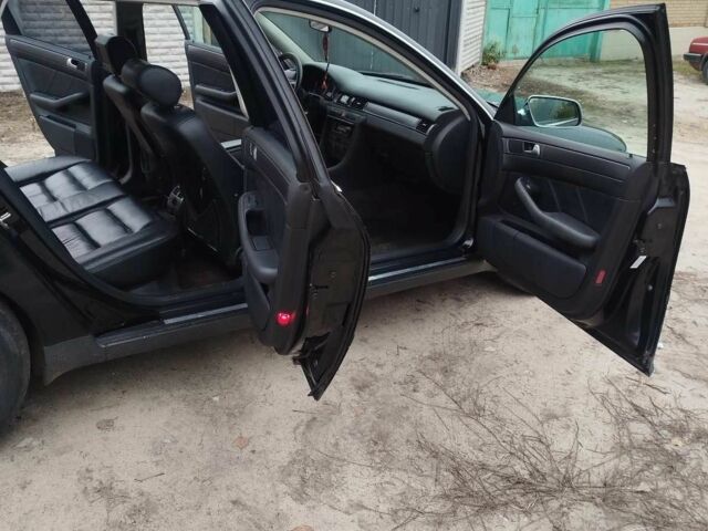 Черный Ауди А6, объемом двигателя 2.4 л и пробегом 230 тыс. км за 3300 $, фото 5 на Automoto.ua