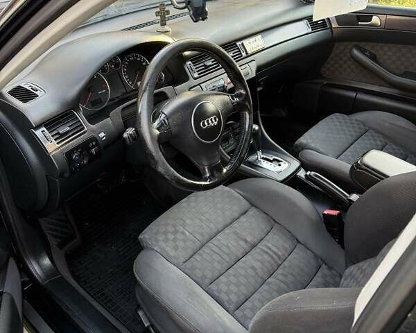 Черный Ауди А6, объемом двигателя 2.5 л и пробегом 257 тыс. км за 5600 $, фото 3 на Automoto.ua