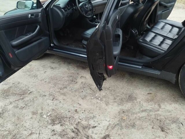 Черный Ауди А6, объемом двигателя 2.4 л и пробегом 230 тыс. км за 3300 $, фото 6 на Automoto.ua