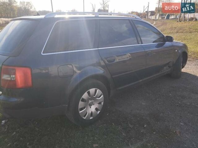 Черный Ауди А6, объемом двигателя 2.5 л и пробегом 248 тыс. км за 1750 $, фото 3 на Automoto.ua