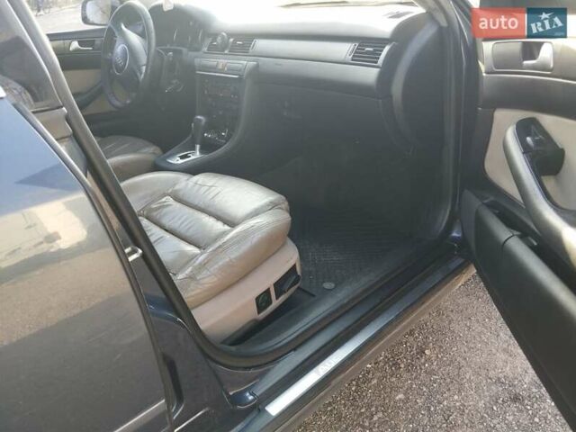 Черный Ауди А6, объемом двигателя 2.5 л и пробегом 248 тыс. км за 1750 $, фото 4 на Automoto.ua
