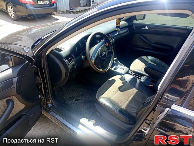 Черный Ауди А6, объемом двигателя 2.5 л и пробегом 316 тыс. км за 5500 $, фото 2 на Automoto.ua