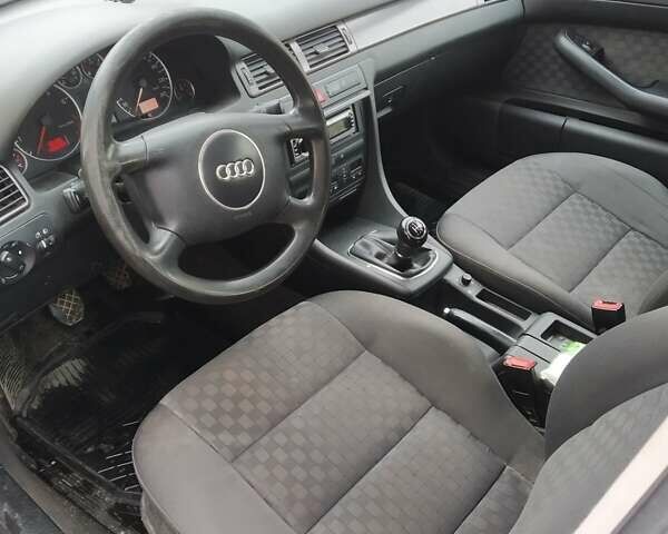 Черный Ауди А6, объемом двигателя 2 л и пробегом 277 тыс. км за 4300 $, фото 2 на Automoto.ua