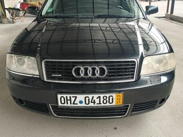 Черный Ауди А6, объемом двигателя 2.5 л и пробегом 337 тыс. км за 3200 $, фото 1 на Automoto.ua