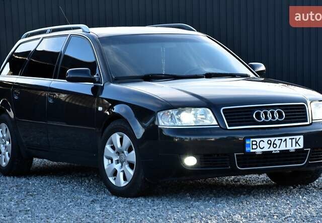 Черный Ауди А6, объемом двигателя 2.5 л и пробегом 290 тыс. км за 4800 $, фото 1 на Automoto.ua