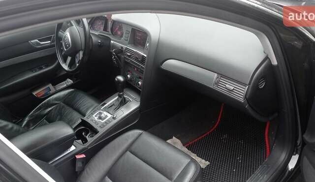 Черный Ауди А6, объемом двигателя 2.4 л и пробегом 306 тыс. км за 7000 $, фото 9 на Automoto.ua