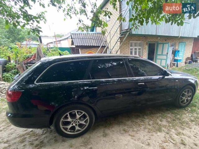 Черный Ауди А6, объемом двигателя 2 л и пробегом 300 тыс. км за 8400 $, фото 1 на Automoto.ua
