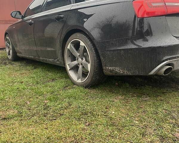 Черный Ауди А6, объемом двигателя 2.8 л и пробегом 255 тыс. км за 11900 $, фото 1 на Automoto.ua