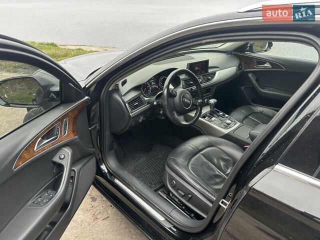 Черный Ауди А6, объемом двигателя 1.97 л и пробегом 286 тыс. км за 12500 $, фото 6 на Automoto.ua