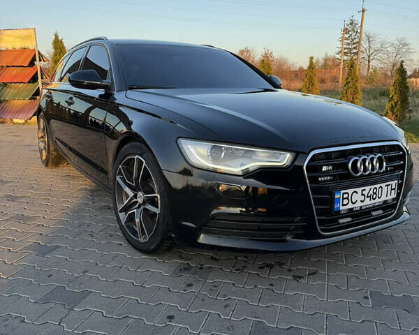Черный Ауди А6, объемом двигателя 2 л и пробегом 288 тыс. км за 13300 $, фото 1 на Automoto.ua