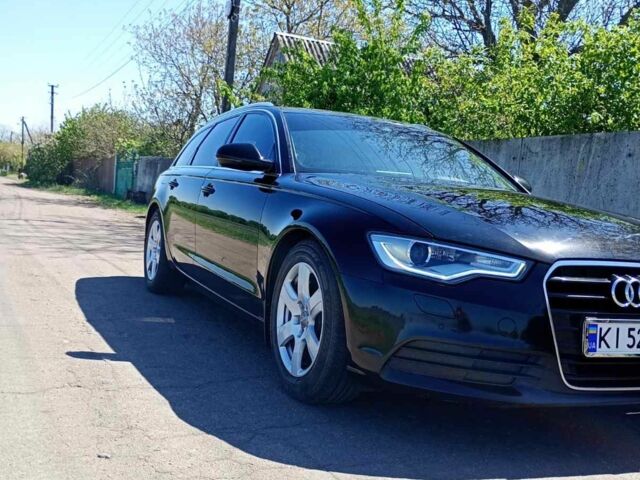 Черный Ауди А6, объемом двигателя 2 л и пробегом 305 тыс. км за 15000 $, фото 1 на Automoto.ua