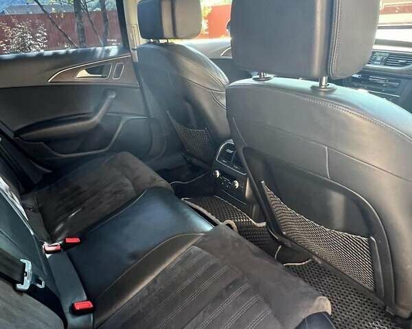 Черный Ауди А6, объемом двигателя 2.97 л и пробегом 317 тыс. км за 15700 $, фото 1 на Automoto.ua
