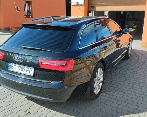 Черный Ауди А6, объемом двигателя 2 л и пробегом 263 тыс. км за 15000 $, фото 1 на Automoto.ua