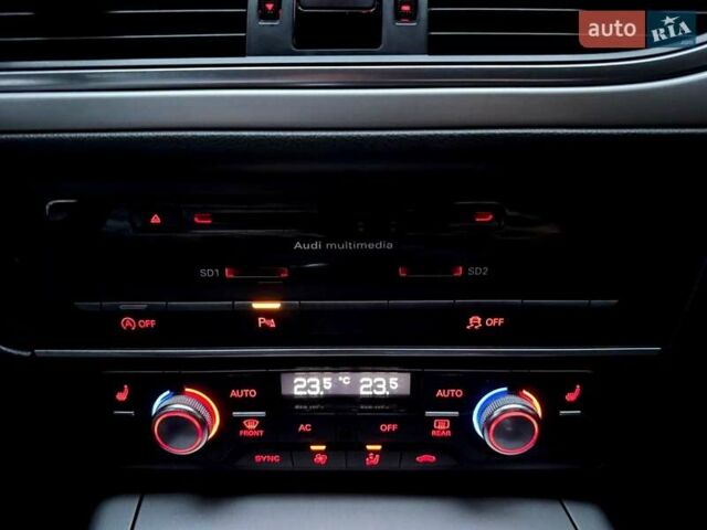 Ауді А6 2012 у Хмельницькому на Automoto.ua Чорний Ауді А6, об'ємом двигуна 2 л та пробігом 228 тис. км за 13300 $, фото 42 на Automoto.ua