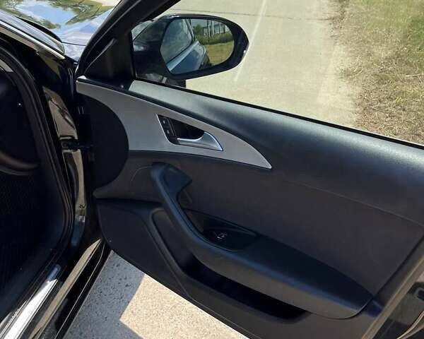 Чорний Ауді А6, об'ємом двигуна 1.97 л та пробігом 294 тис. км за 14000 $, фото 4 на Automoto.ua