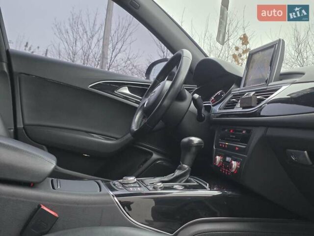 Черный Ауди А6, объемом двигателя 2 л и пробегом 183 тыс. км за 16500 $, фото 63 на Automoto.ua