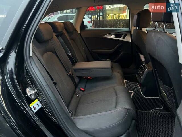 Чорний Ауді А6, об'ємом двигуна 1.97 л та пробігом 292 тис. км за 13990 $, фото 12 на Automoto.ua