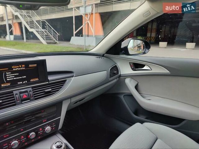 Черный Ауди А6, объемом двигателя 2 л и пробегом 294 тыс. км за 12800 $, фото 4 на Automoto.ua