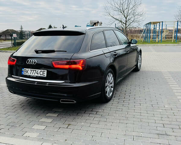 Черный Ауди А6, объемом двигателя 1.97 л и пробегом 240 тыс. км за 19900 $, фото 4 на Automoto.ua