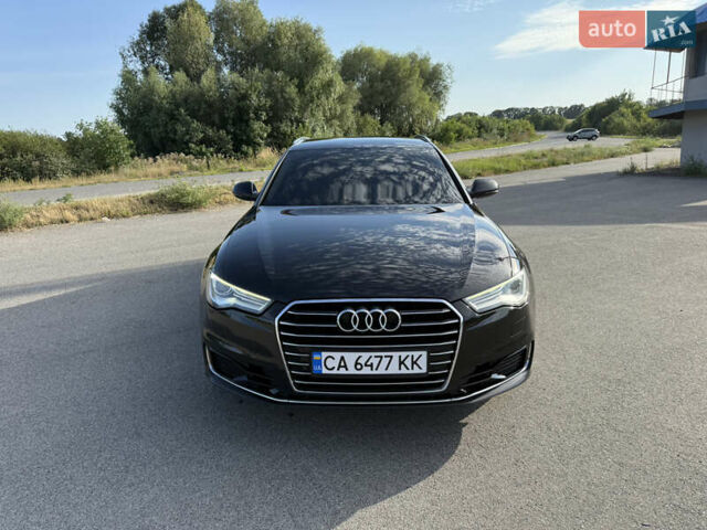 Чорний Ауді А6, об'ємом двигуна 2 л та пробігом 260 тис. км за 18900 $, фото 1 на Automoto.ua