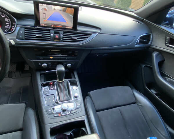 Чорний Ауді А6, об'ємом двигуна 1.97 л та пробігом 291 тис. км за 18500 $, фото 13 на Automoto.ua