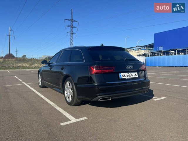 Черный Ауди А6, объемом двигателя 1.97 л и пробегом 251 тыс. км за 21000 $, фото 2 на Automoto.ua