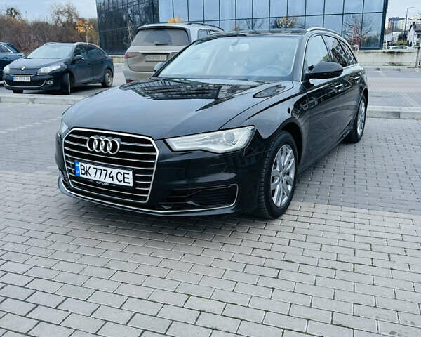 Черный Ауди А6, объемом двигателя 1.97 л и пробегом 240 тыс. км за 19900 $, фото 1 на Automoto.ua