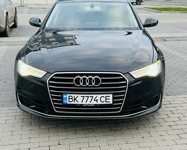 Черный Ауди А6, объемом двигателя 1.97 л и пробегом 240 тыс. км за 19900 $, фото 2 на Automoto.ua