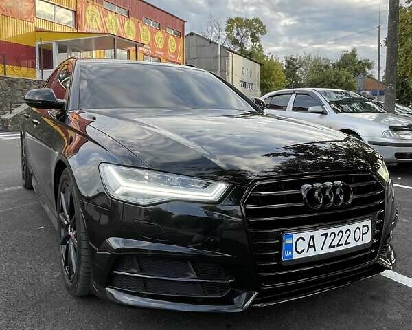 Черный Ауди А6, объемом двигателя 1.97 л и пробегом 153 тыс. км за 25800 $, фото 1 на Automoto.ua