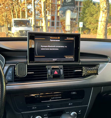 Черный Ауди А6, объемом двигателя 2 л и пробегом 243 тыс. км за 18000 $, фото 22 на Automoto.ua