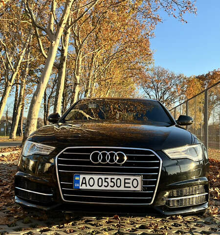 Черный Ауди А6, объемом двигателя 2 л и пробегом 243 тыс. км за 18000 $, фото 1 на Automoto.ua