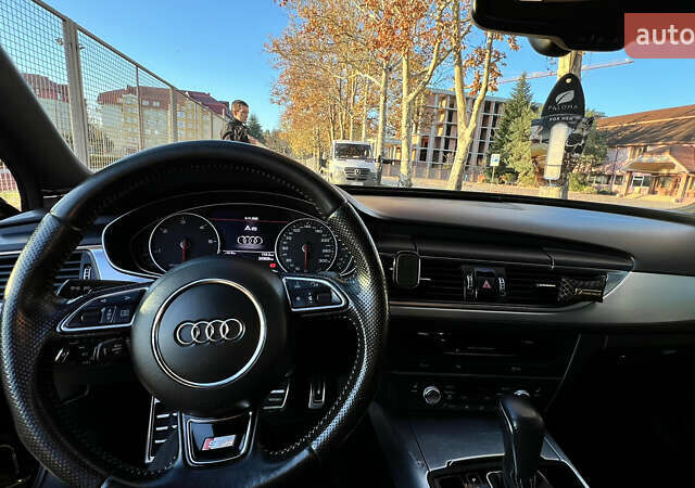 Черный Ауди А6, объемом двигателя 2 л и пробегом 243 тыс. км за 18000 $, фото 21 на Automoto.ua