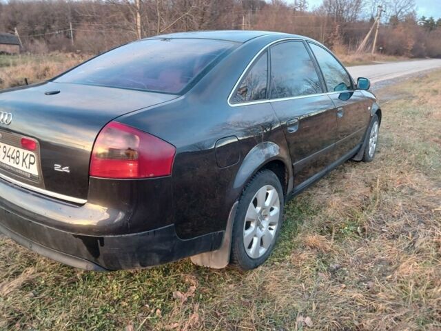 Фиолетовый Ауди А6, объемом двигателя 2 л и пробегом 450 тыс. км за 3500 $, фото 2 на Automoto.ua