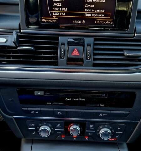 Коричневый Ауди А6, объемом двигателя 2 л и пробегом 219 тыс. км за 15899 $, фото 18 на Automoto.ua