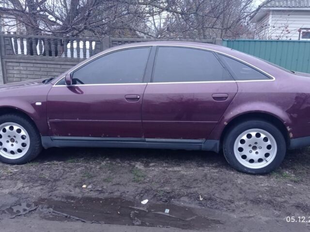 Красный Ауди А6, объемом двигателя 2.5 л и пробегом 300 тыс. км за 3088 $, фото 1 на Automoto.ua