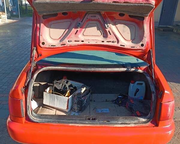 Красный Ауди А6, объемом двигателя 2 л и пробегом 300 тыс. км за 1750 $, фото 1 на Automoto.ua