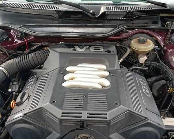 Красный Ауди А6, объемом двигателя 2.6 л и пробегом 325 тыс. км за 4200 $, фото 6 на Automoto.ua