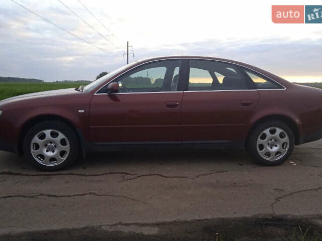 Красный Ауди А6, объемом двигателя 1.8 л и пробегом 199 тыс. км за 5800 $, фото 5 на Automoto.ua