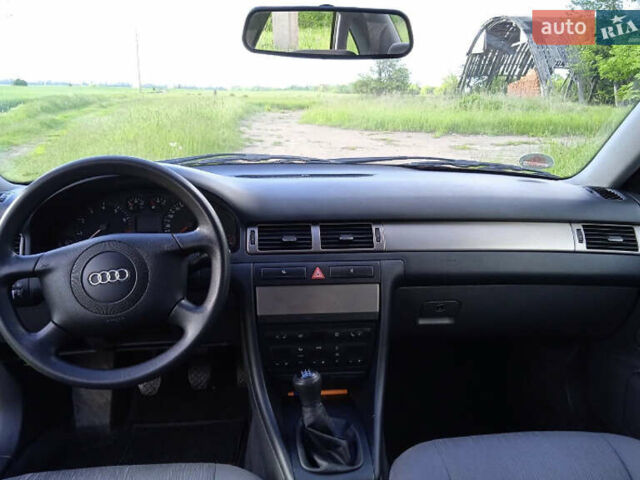 Красный Ауди А6, объемом двигателя 1.8 л и пробегом 199 тыс. км за 5800 $, фото 3 на Automoto.ua