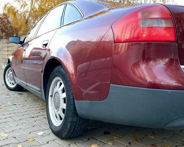 Красный Ауди А6, объемом двигателя 2.4 л и пробегом 280 тыс. км за 5200 $, фото 1 на Automoto.ua